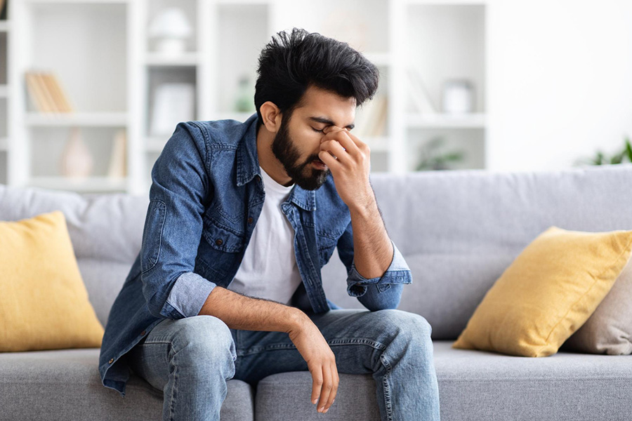 Altered dynamic functional connectivity and reduced higher order information interaction in Parkinson’s patients with hyposmia